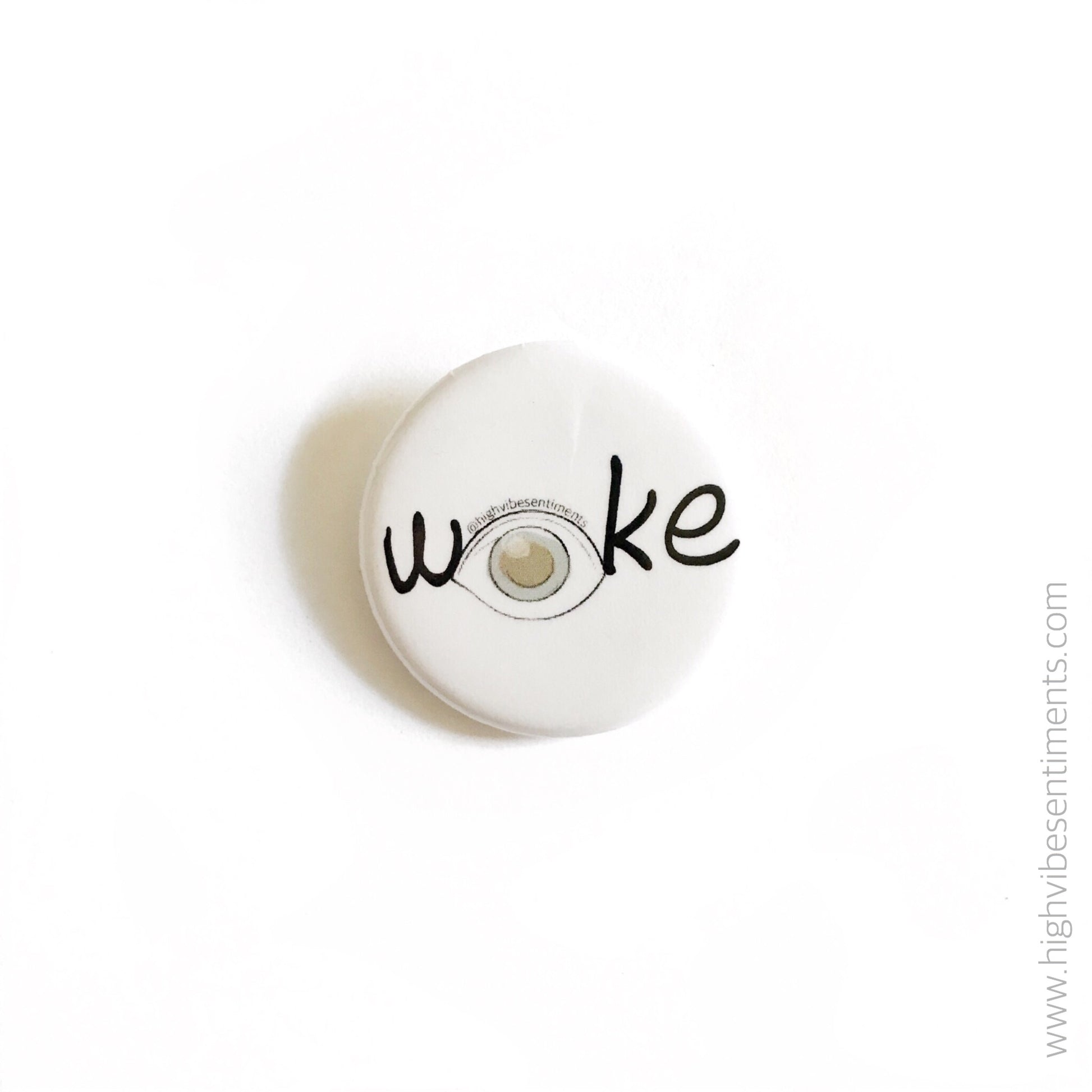 High Vibe Sentiments “woke” button