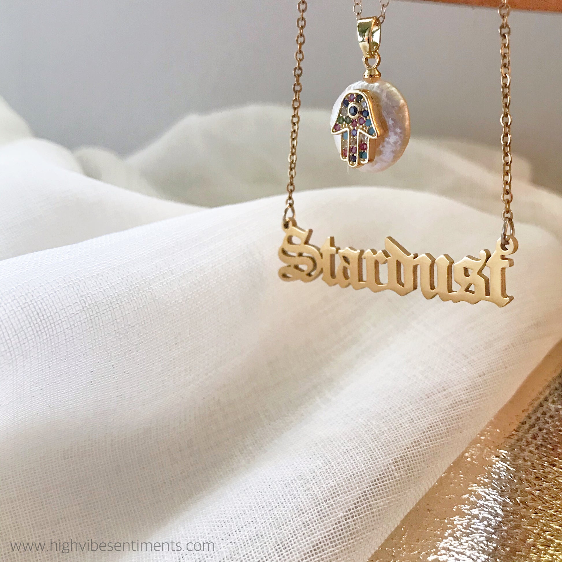 High Vibe Sentiments Stardust Nameplate and Hamsa and Pearl Necklace